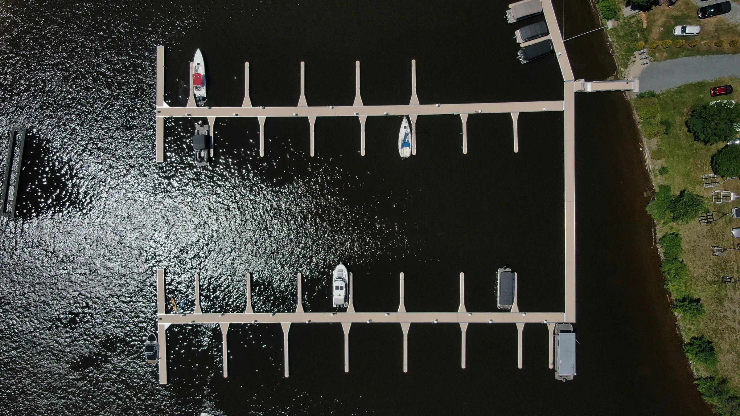 people standing on white wooden dock during daytime