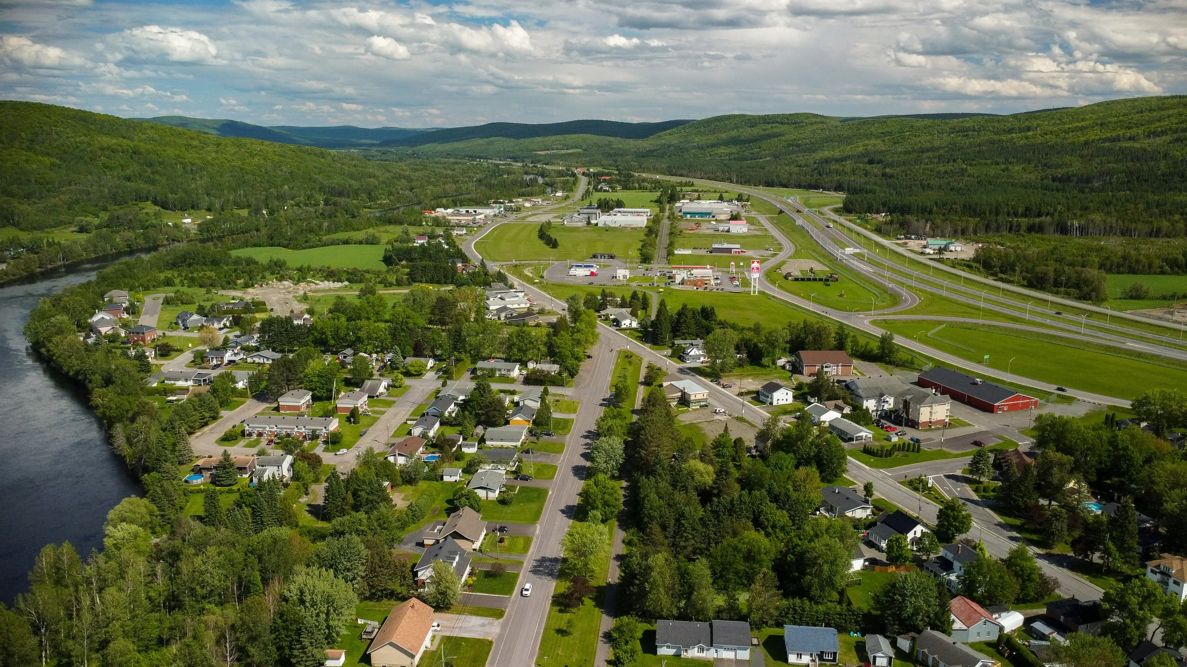 a landscape with houses and trees