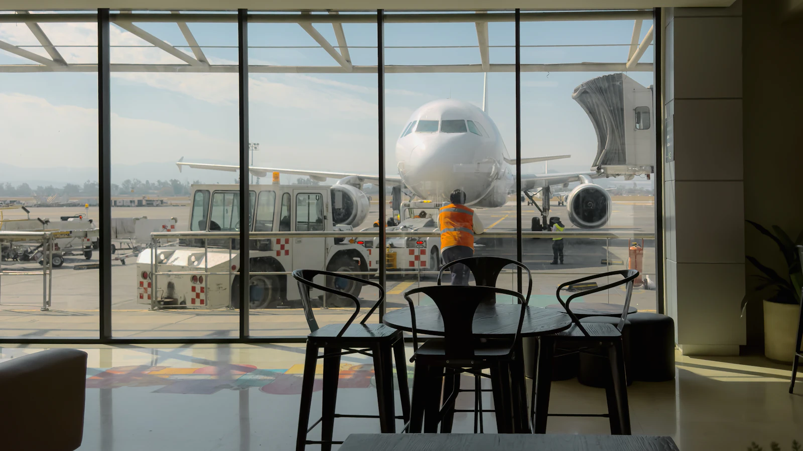 Airport view with an airplane at the window